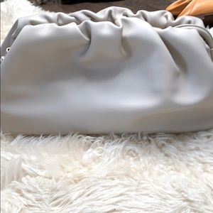 100% leather clutch brand new